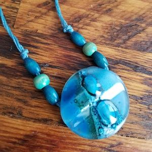 1 of a kind glass necklace